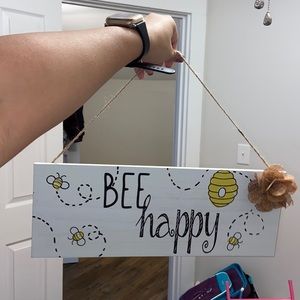 Bee happy sign